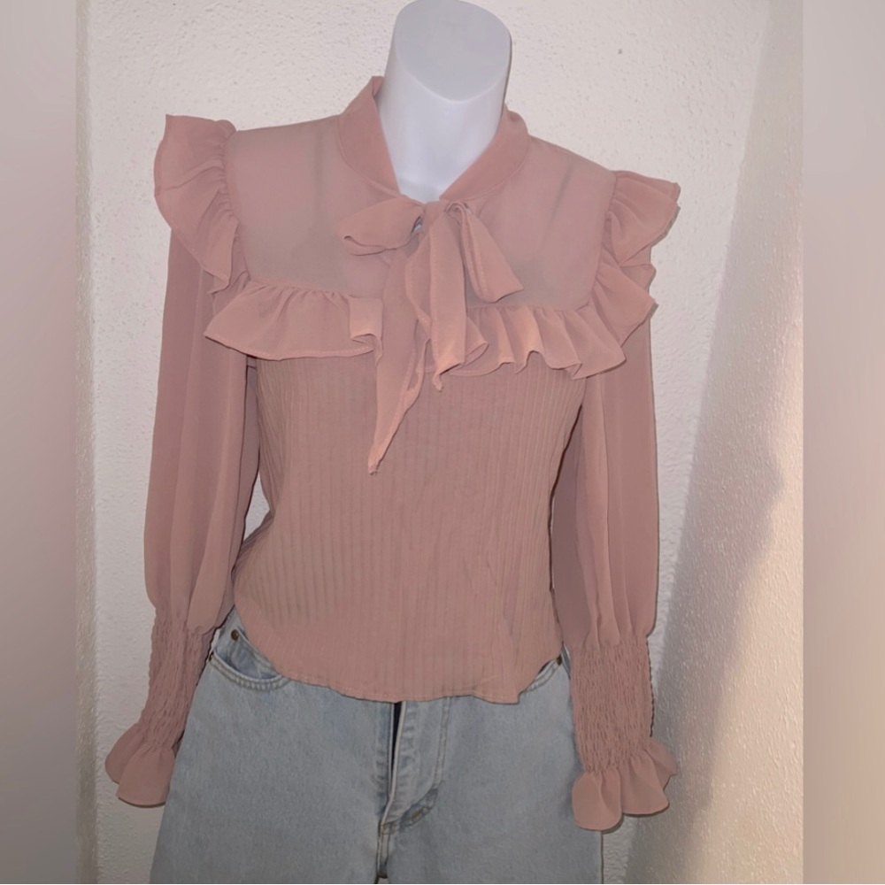 Pink bow tied blouse